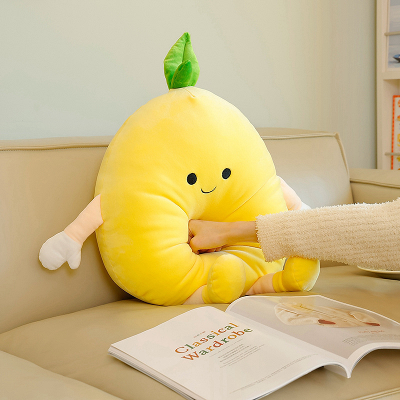 Pomelo plush pillow with soft plush filling showing gentle compression, highlighting its cushioned support and comfortable texture for everyday use