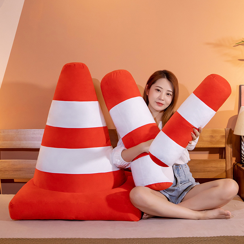 Traffic cone plush pillow with cone and traffic bollard shapes in orange and white stripes, soft plush cushions for lounging, resting, or playful home decor