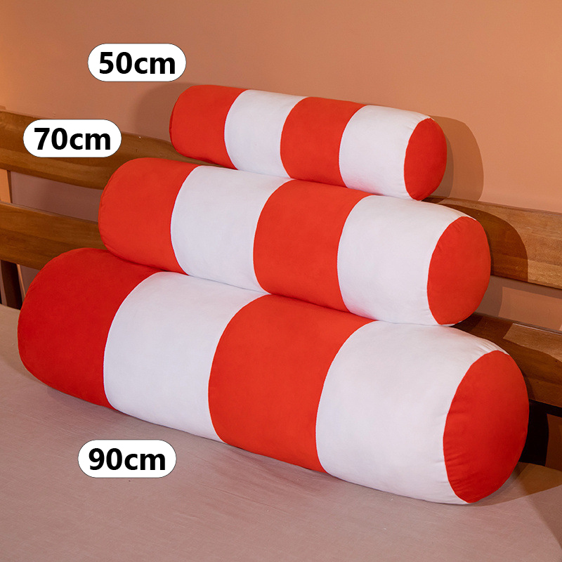 Traffic bollard plush pillow in orange and white stripes shown in three sizes, 50 cm, 70 cm, and 90 cm, soft cylindrical cushion for hugging and home decor