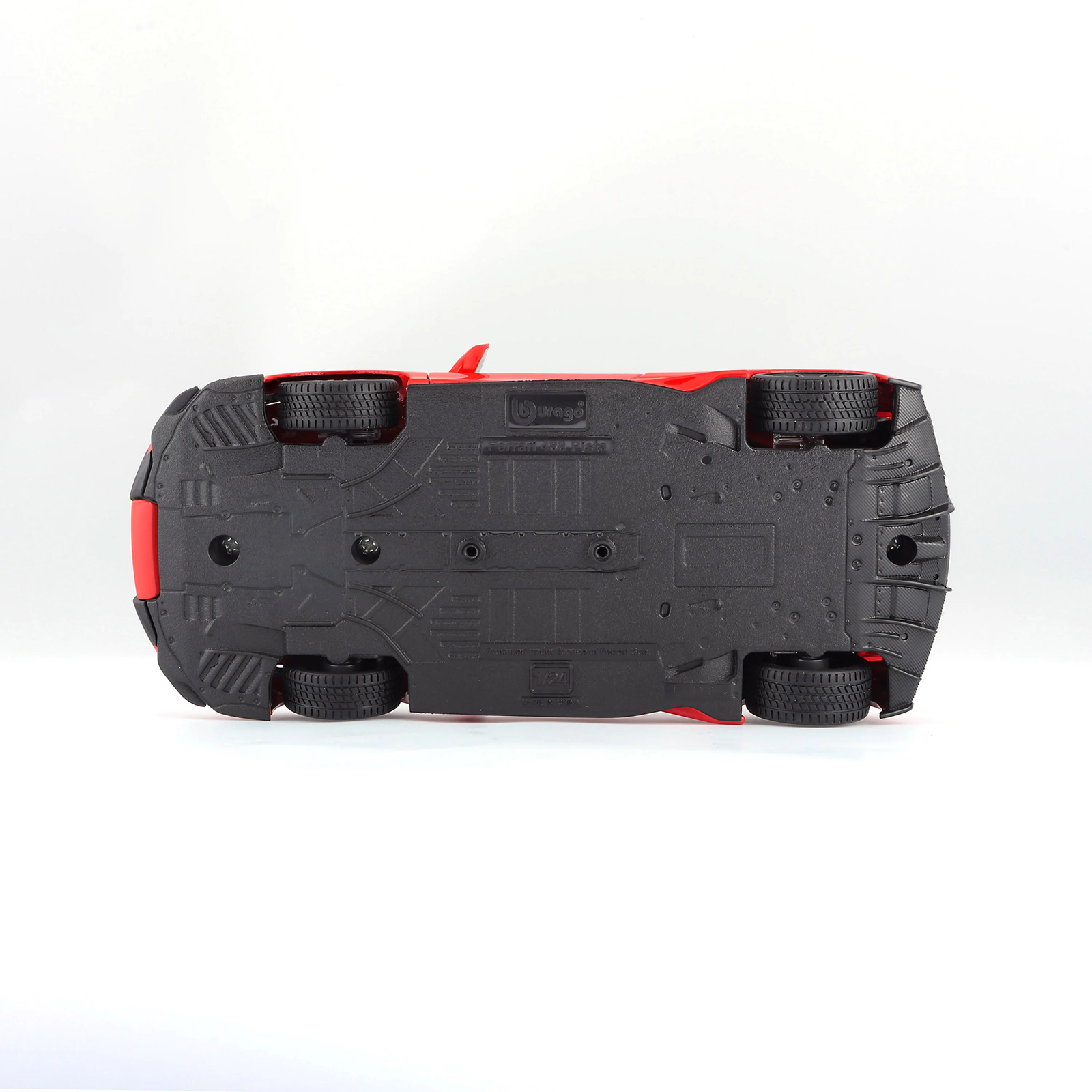 Ferrari 488 Pista R&P Red 1:24 diecast model car underside view, showing chassis details, tire tread, and base structure
