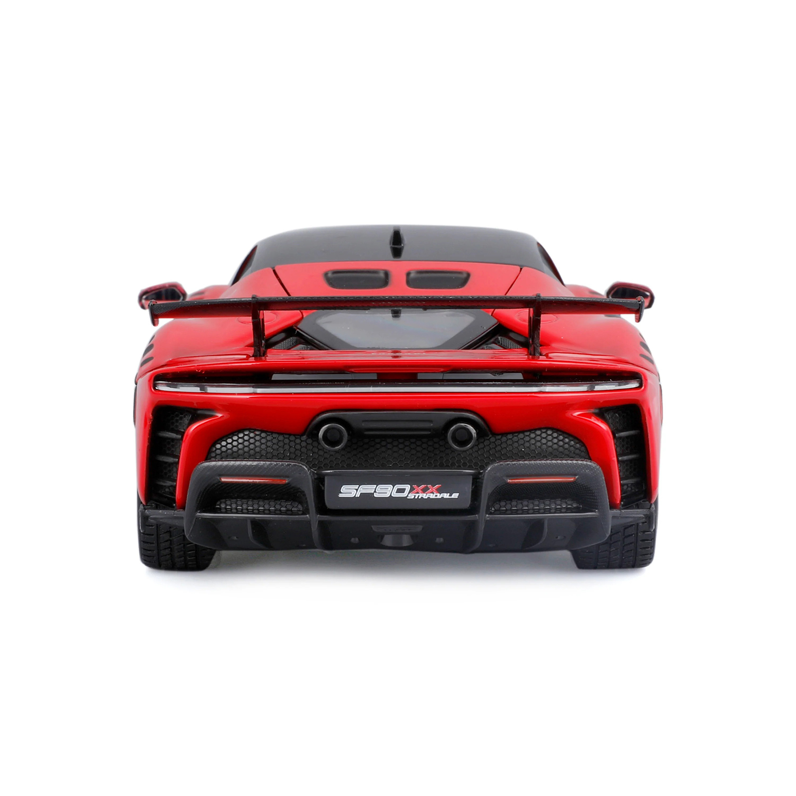 Rear view of Ferrari SF90 XX Stradale 1:24 diecast model car with large rear wing, dual exhaust, diffuser, and detailed taillights