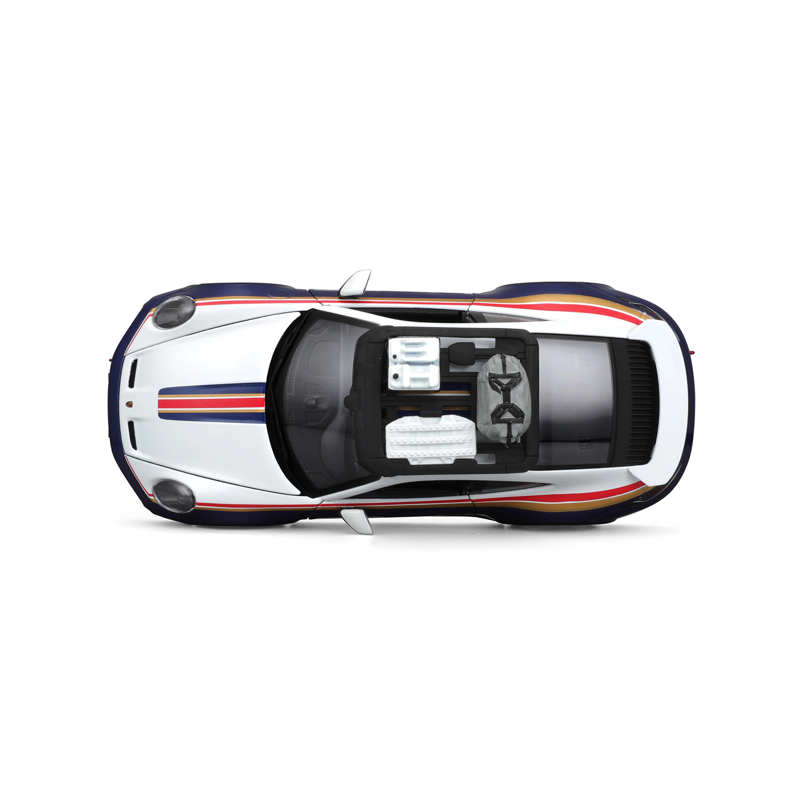 Top view of Porsche 911 Dakar 1:24 diecast model showing roof rack accessories, #953 rally stripes, and detailed body design