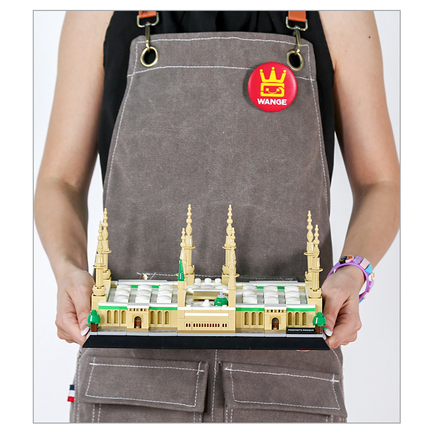 Prophet’s Mosque building blocks model held for size reference, highlighting detailed minarets, structure, and display scale for decoration or collection
