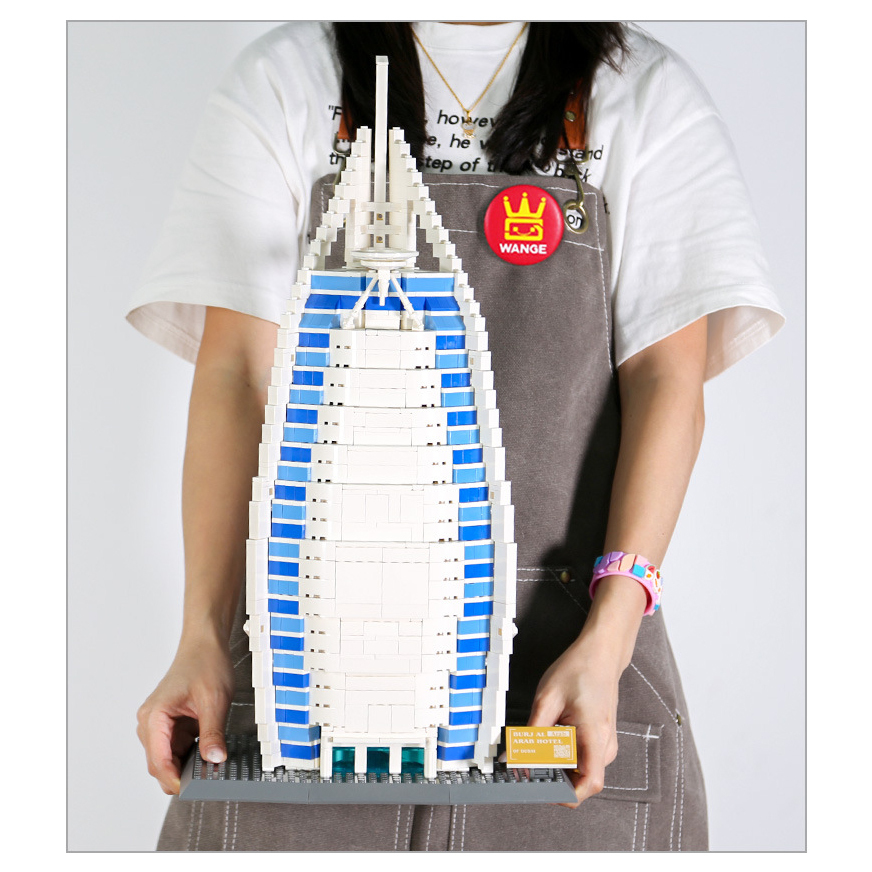 Burj Al Arab Hotel Dubai building blocks model held in hands showing size scale, detailed sail shaped architecture set for display and collection