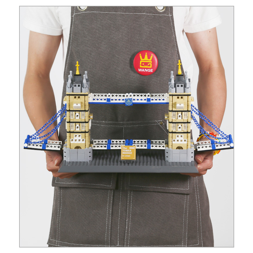 Tower Bridge London England building blocks model held for scale, featuring twin towers, blue suspension details, and sturdy base with display-ready architectural finish