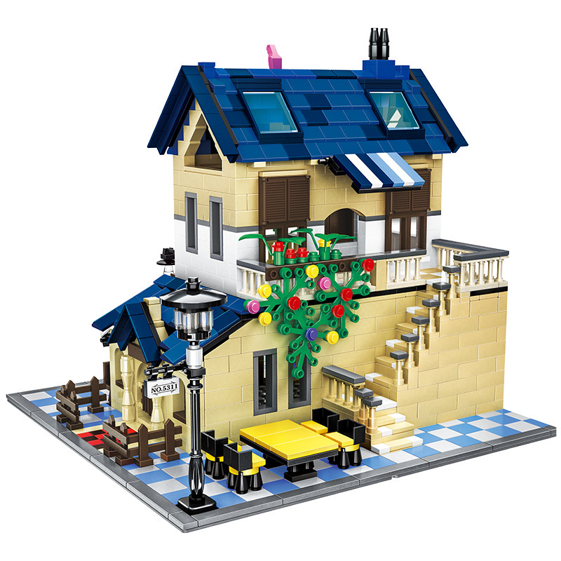 French country lodge building blocks model featuring detailed villa design, blue roof tiles, balcony railing, patio seating, and decorative greenery on a tiled base