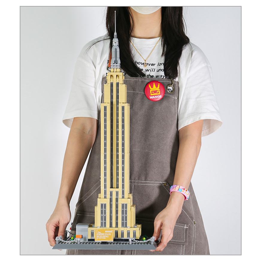 Empire State Building building blocks model held for scale, featuring tall skyscraper structure, detailed base, and realistic proportions, ideal for display, collection, and home decor