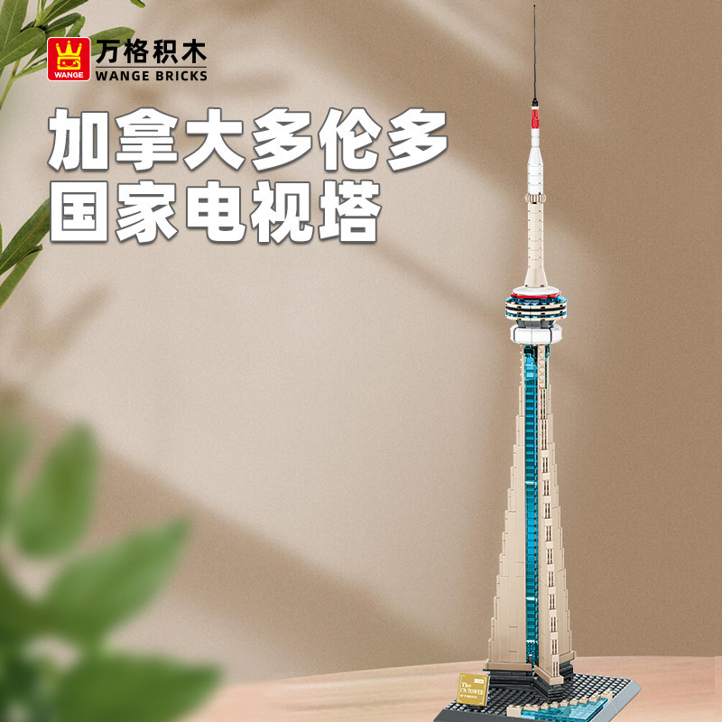 CN Tower building blocks model displayed on a wooden surface with soft natural lighting, showcasing tall antenna, observation deck details, and a clean modern decor setting