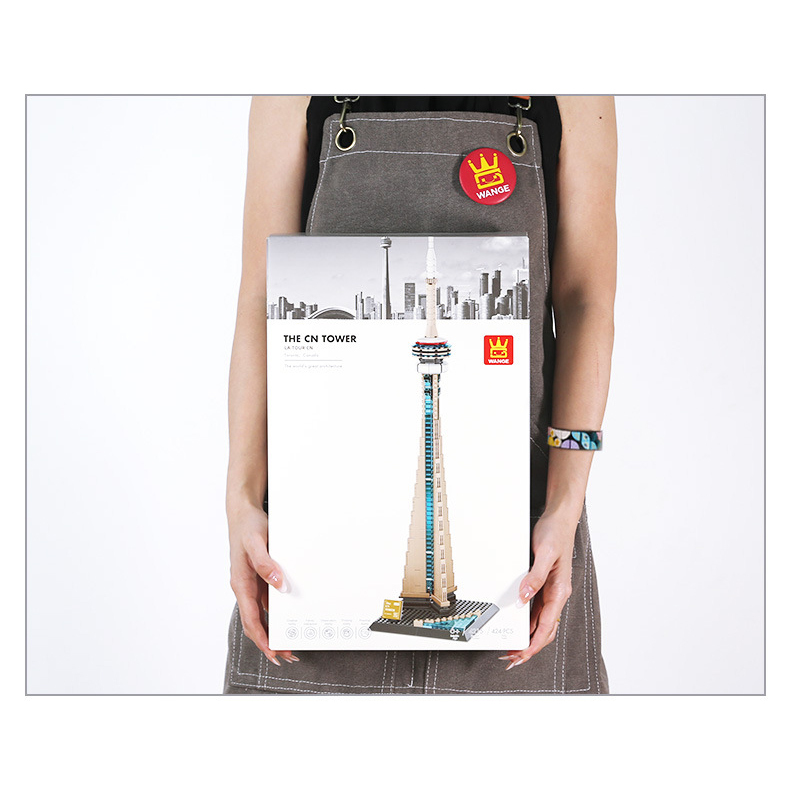 CN Tower building blocks set packaging held for size reference, showing box scale, product image, and presentation suitable for gifting, display, or collection