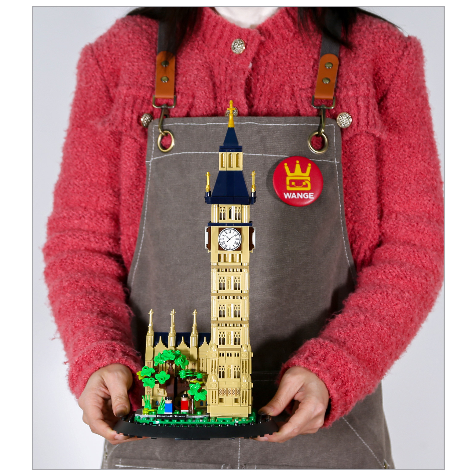 Elizabeth Tower building blocks model displayed on base, held for size reference, showcasing detailed clock tower design and architectural features