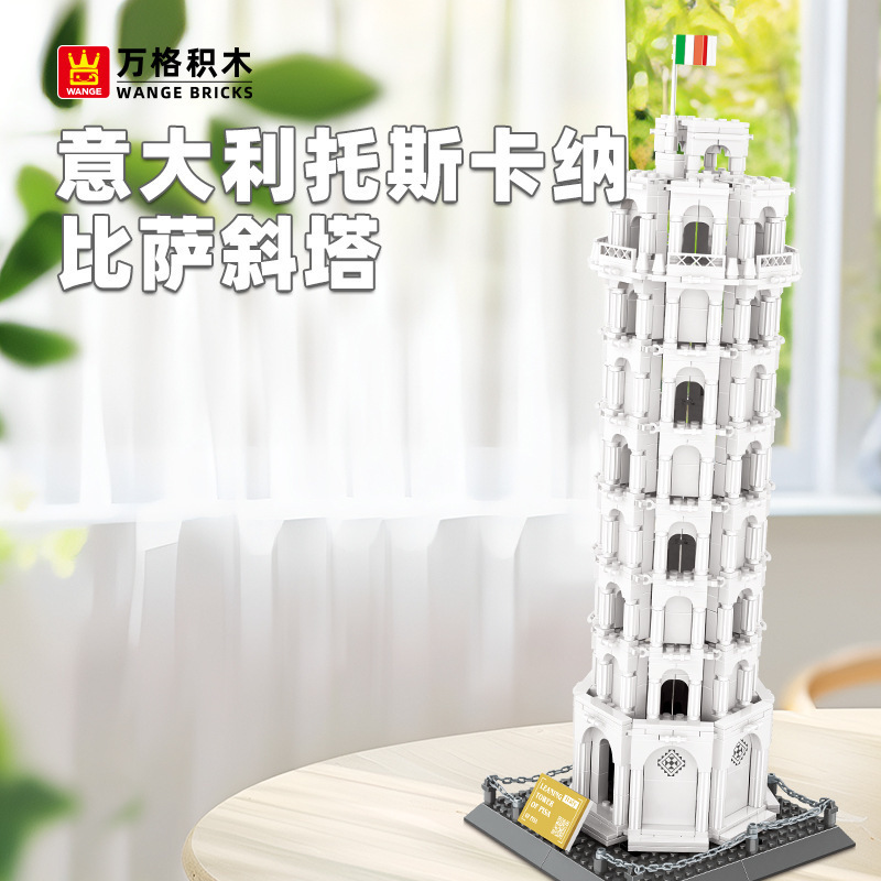 Leaning Tower of Pisa building blocks model displayed on a tabletop, featuring detailed arches and a realistic tilted design in a bright, cozy indoor setting