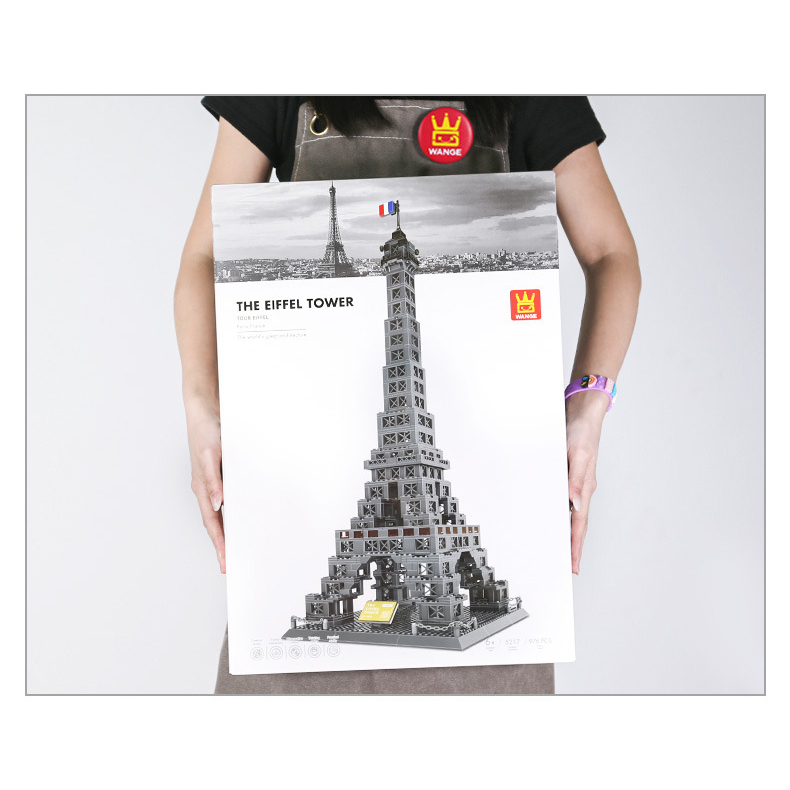 Eiffel Tower building blocks set packaging shown in hand for size reference, highlighting large box format suitable for display, storage, or gift presentation