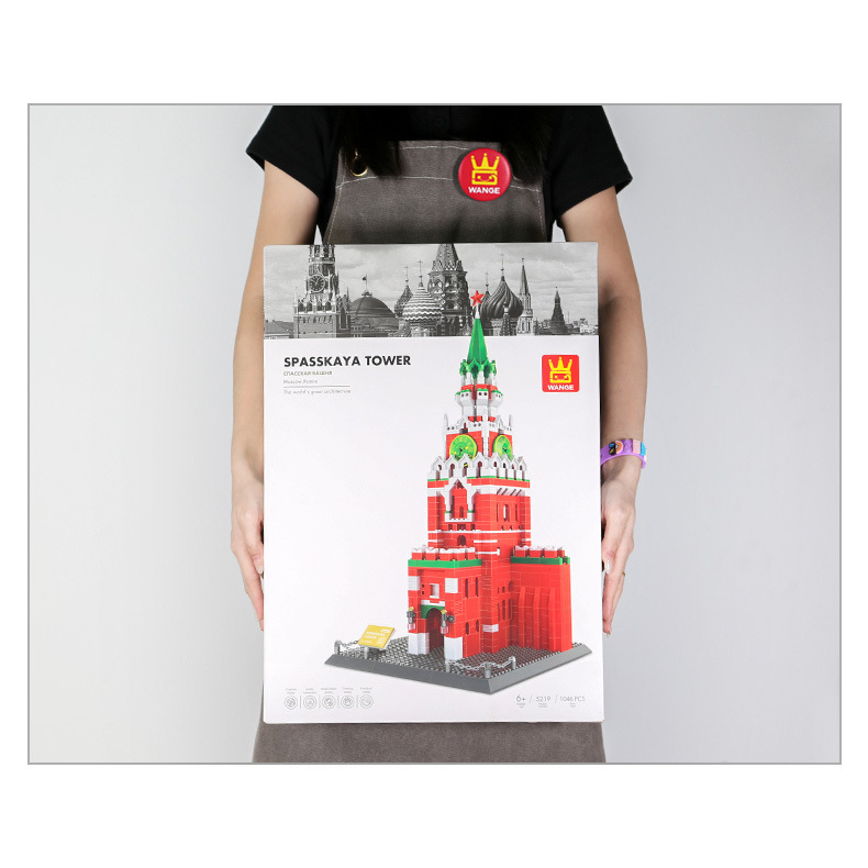 Spasskaya Tower building blocks set packaging held for size reference, showing large color box with Moscow Kremlin tower design and clear product presentation