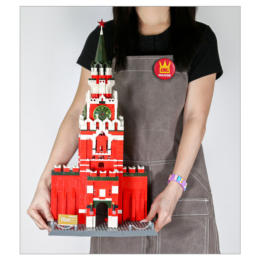 Spasskaya Tower building blocks model displayed on base, showing detailed red structure, clock face, and tall spire with star for size and scale reference