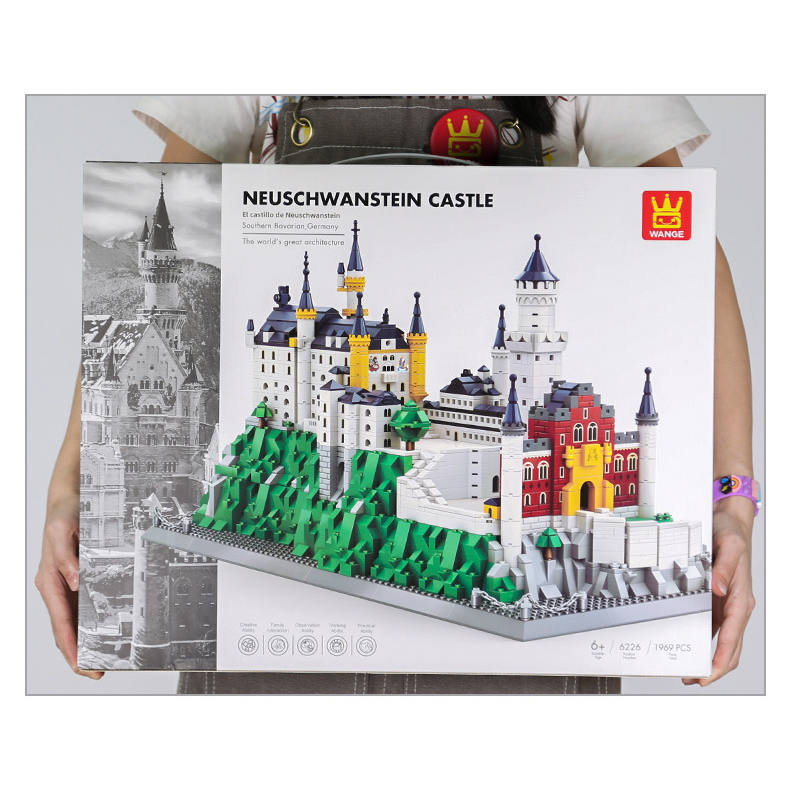 Neuschwanstein Castle building blocks set packaging box shown in scale, highlighting large box size, detailed artwork, and premium presentation for display or gifting