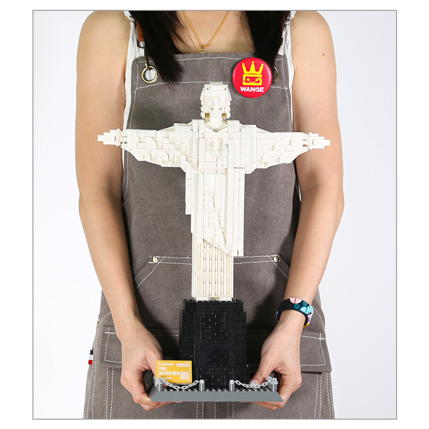 Christ the Redeemer building blocks model held for size reference, showing full structure, display base and detailed brick construction