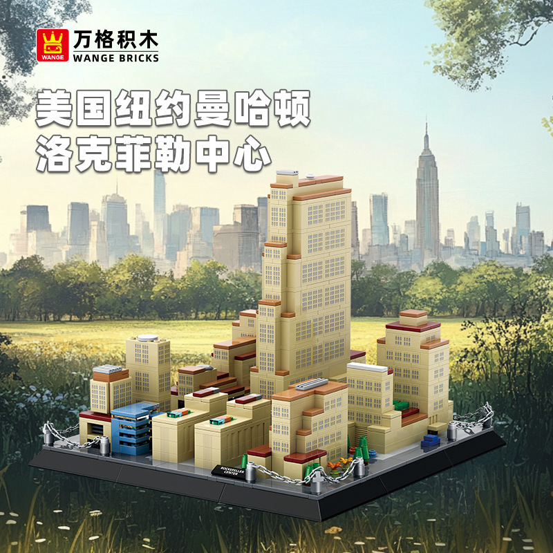 Rockefeller Center New York building blocks model displayed on a base with city skyline background, featuring detailed Art Deco tower and surrounding buildings in a realistic outdoor setting