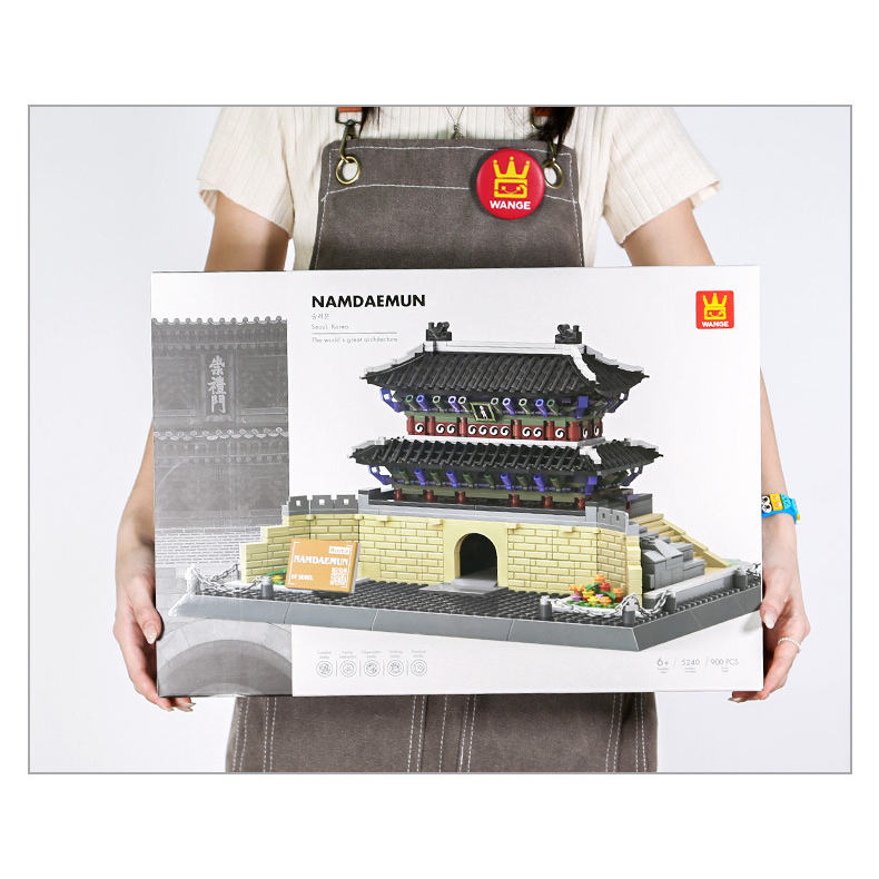 Namdaemun building blocks box held for size reference, showing large packaging scale and detailed model artwork on front