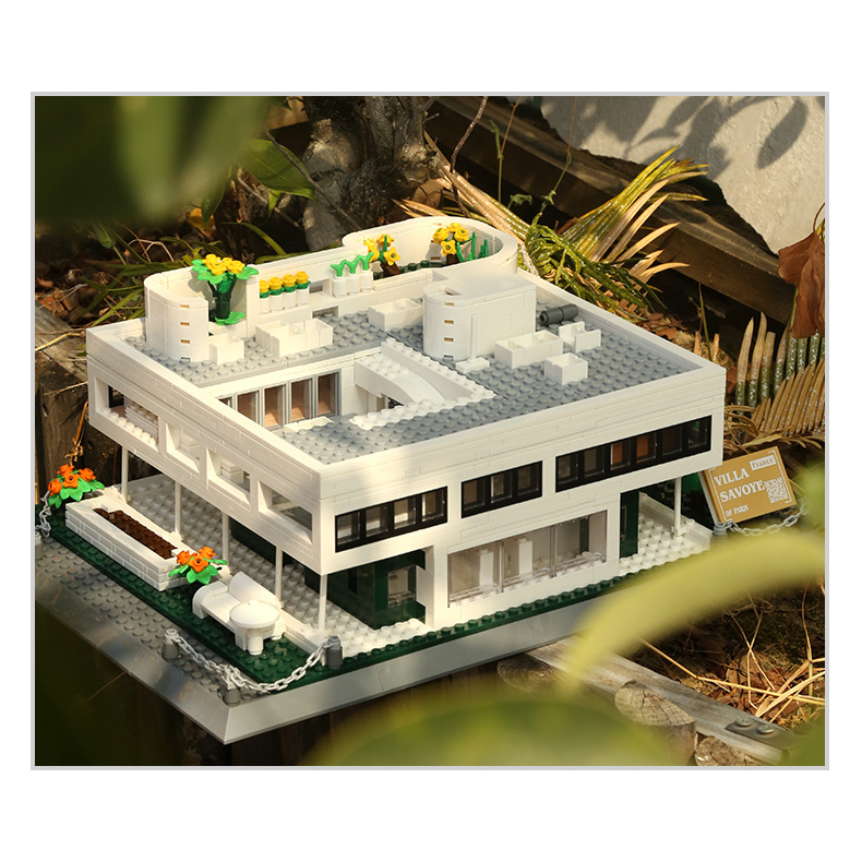 Villa Savoye Paris building blocks model displayed outdoors with natural lighting, highlighting modern architecture design, rooftop garden, and clean geometric structure