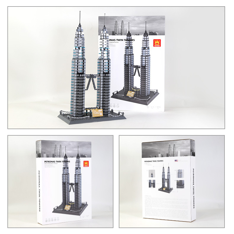 Petronas Twin Towers building blocks model with packaging box, completed twin tower display alongside product box, ideal for collection, display, or gifting