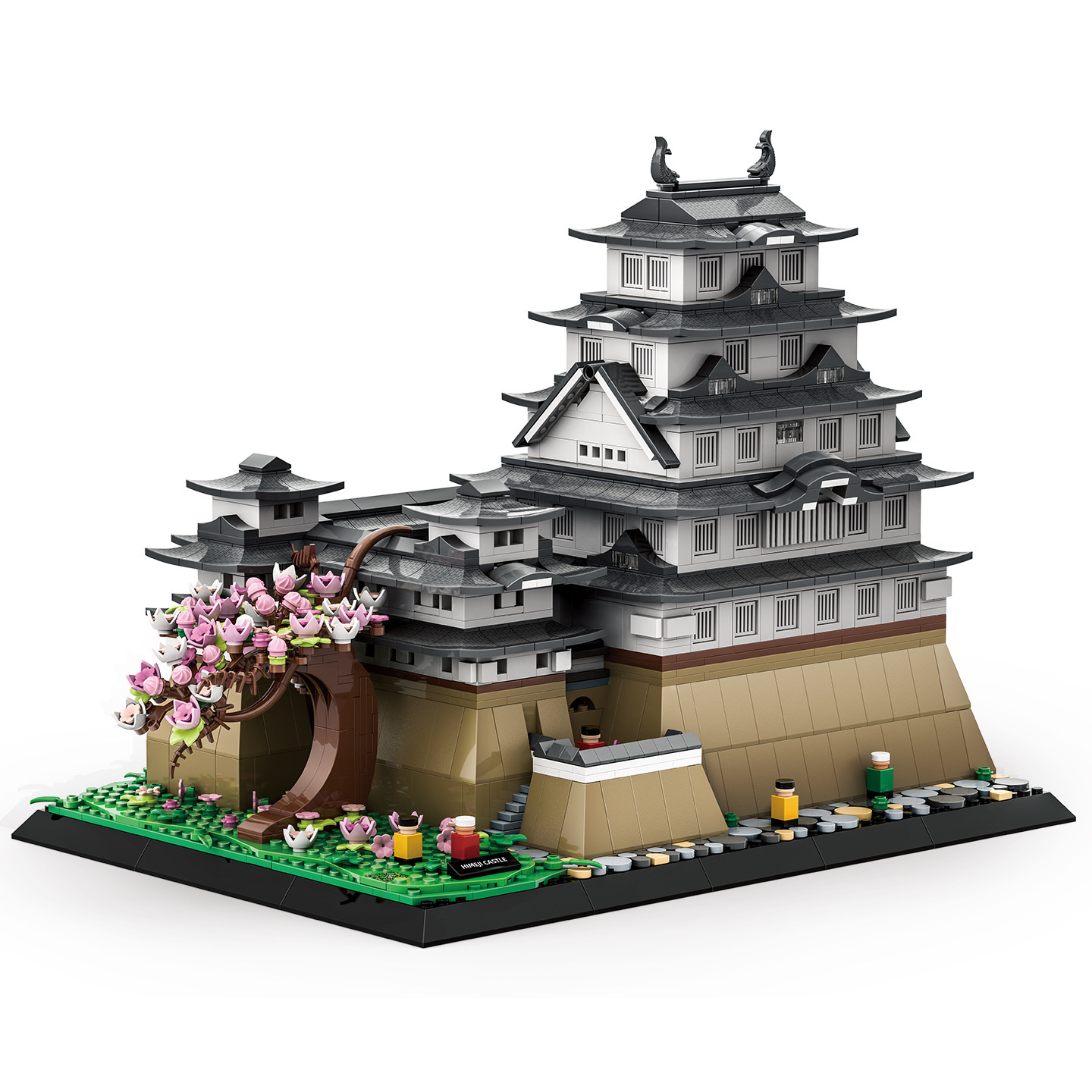 WANGE Himeji Castle building blocks model showing multi-tiered roof design, detailed walls, and landscaped base on a clean background