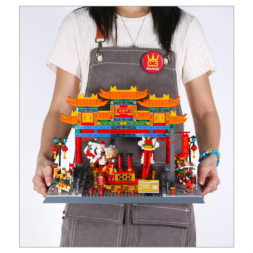 China Town building blocks completed model display with traditional Chinese arch, festive decorations, and detailed street scene