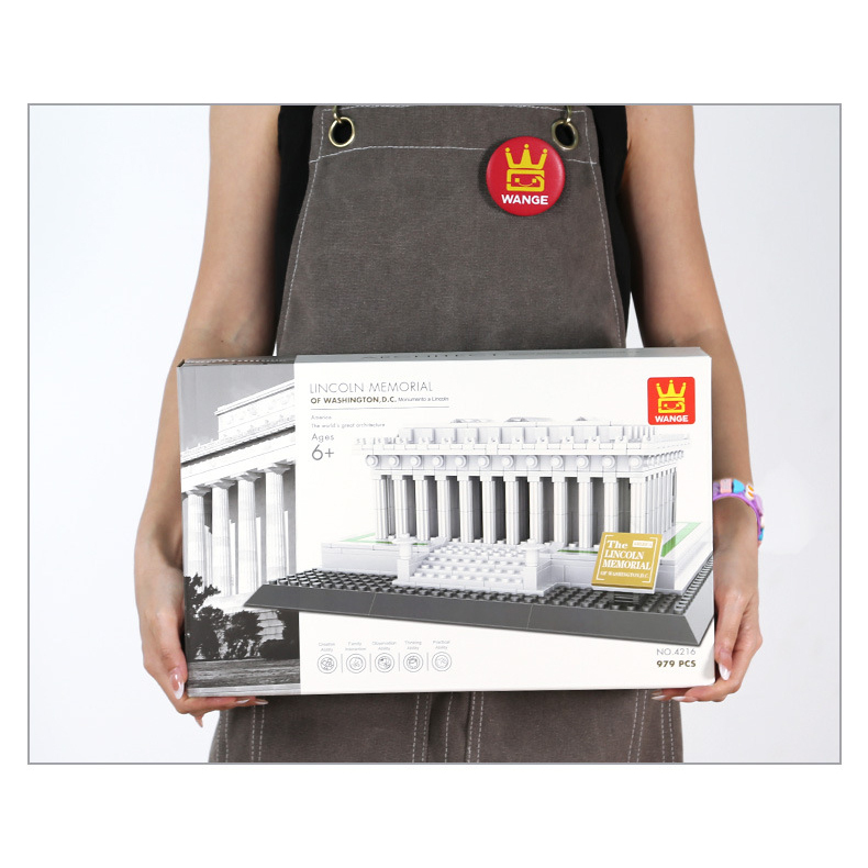 Lincoln Memorial building blocks set box held for size reference, showing packaging scale and product presentation