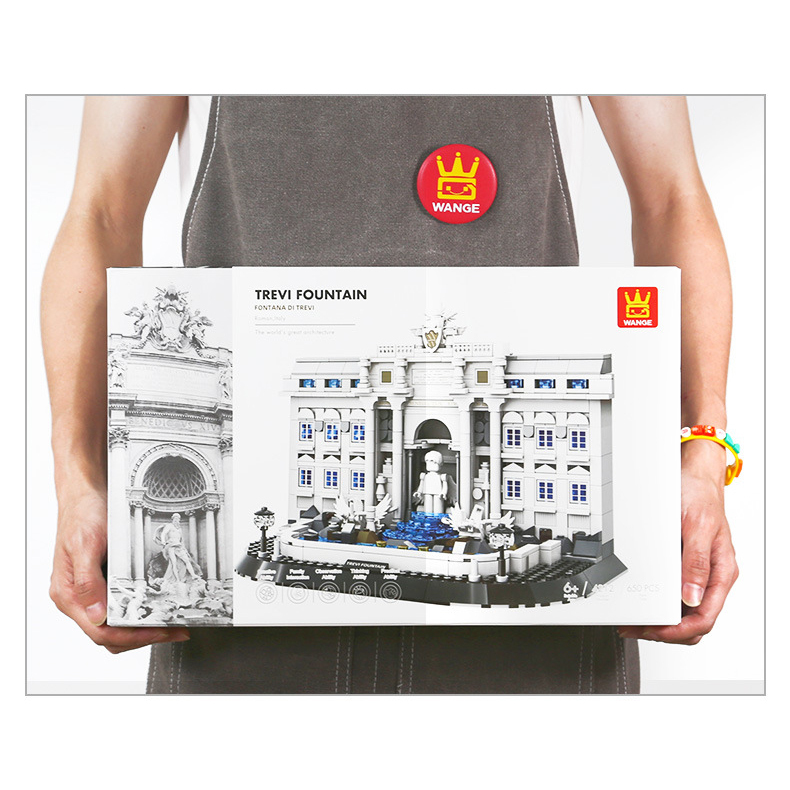 WANGE Trevi Fountain building blocks set box held in hands, highlighting packaging design, product scale reference, and gift-ready presentation for architecture model enthusiasts