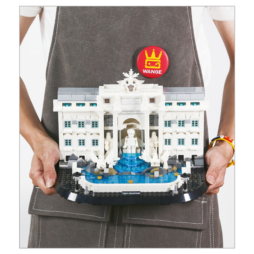 WANGE Trevi Fountain Rome Italy building blocks model held in hands, showcasing detailed facade, sculptural elements, and blue water base for display and collection