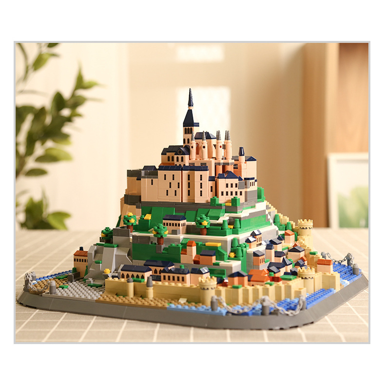 Mont-Saint-Michel building blocks model displayed on tabletop, showcasing layered island structure, detailed architecture, and decorative home display setting