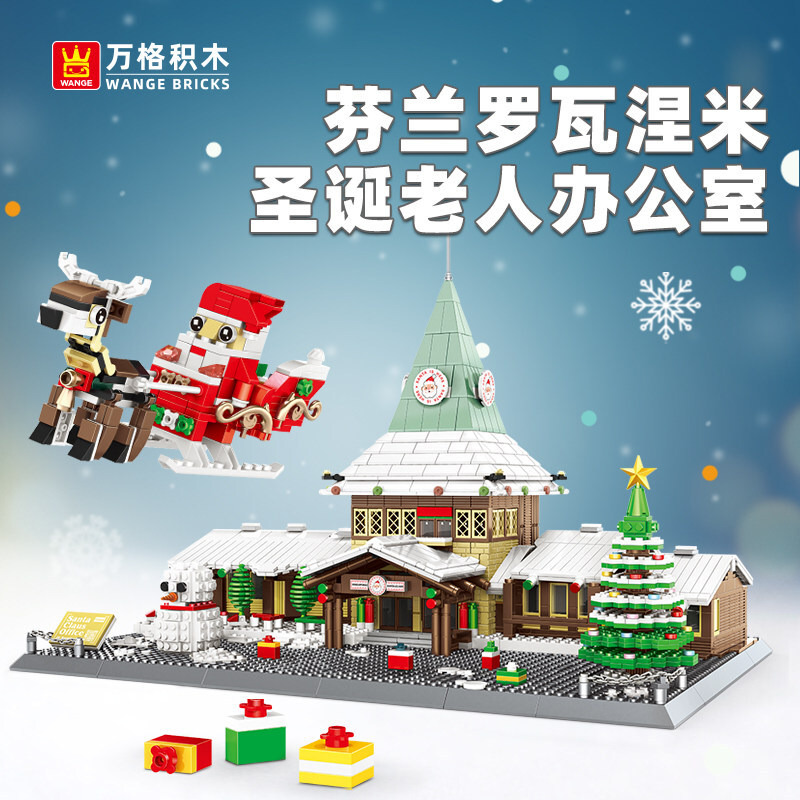 Santa Claus Office building blocks Christmas village scene with snowy roof, decorated tree, sleigh and reindeer, festive winter display model