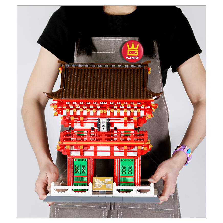 Kiyomizu-dera Niomon Gate building blocks model held for scale, featuring detailed red gate structure, layered roof, and display-ready architectural design