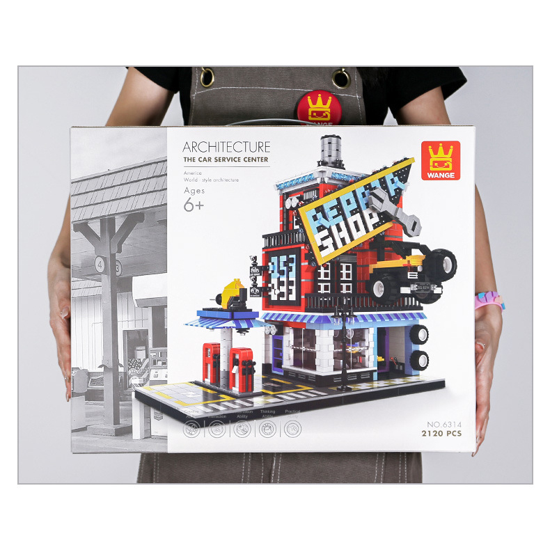 WANGE building blocks set box featuring car service center model with bold signage, multi-level design, and 2120 pieces