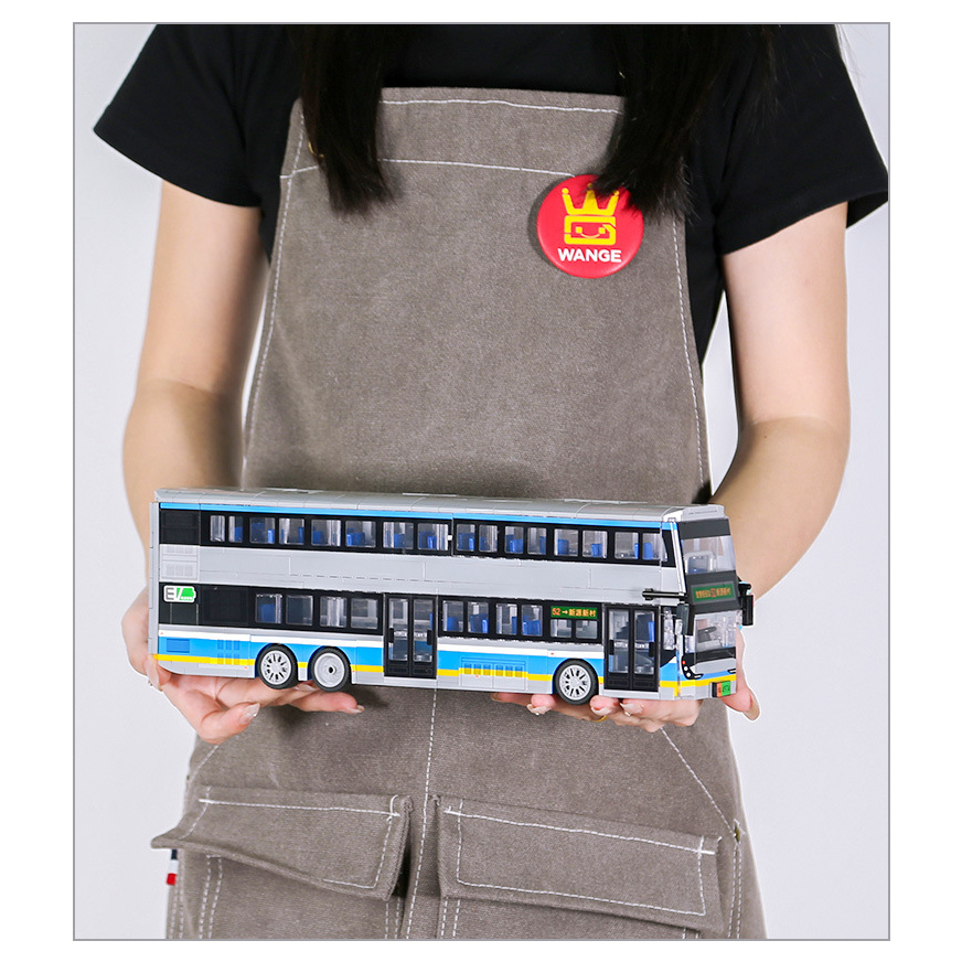 Double-decker electric bus building blocks model held for scale, showcasing realistic proportions, detailed structure, and display size for desks or shelves