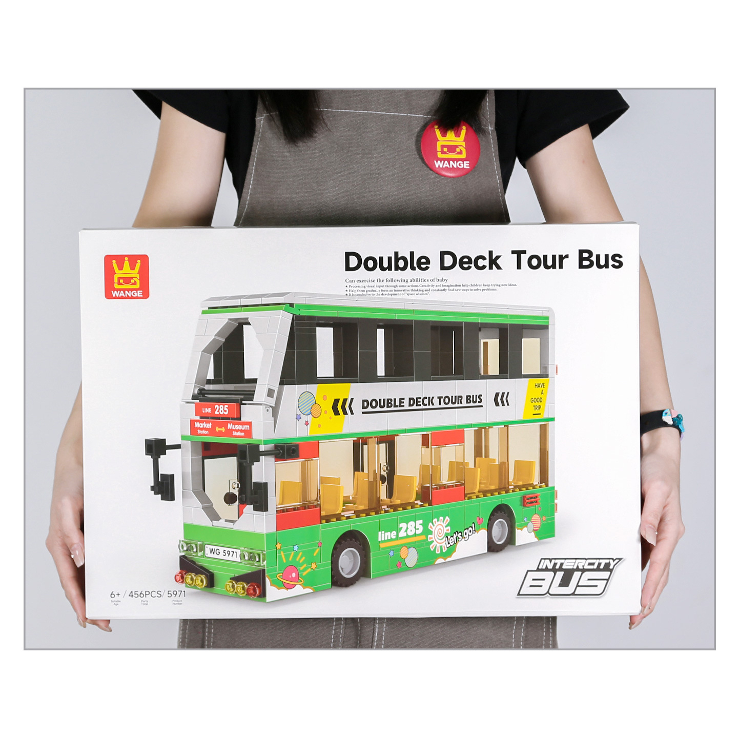 Double Deck Tour Bus building blocks set box displayed for scale, showing detailed bus model illustration and packaging design
