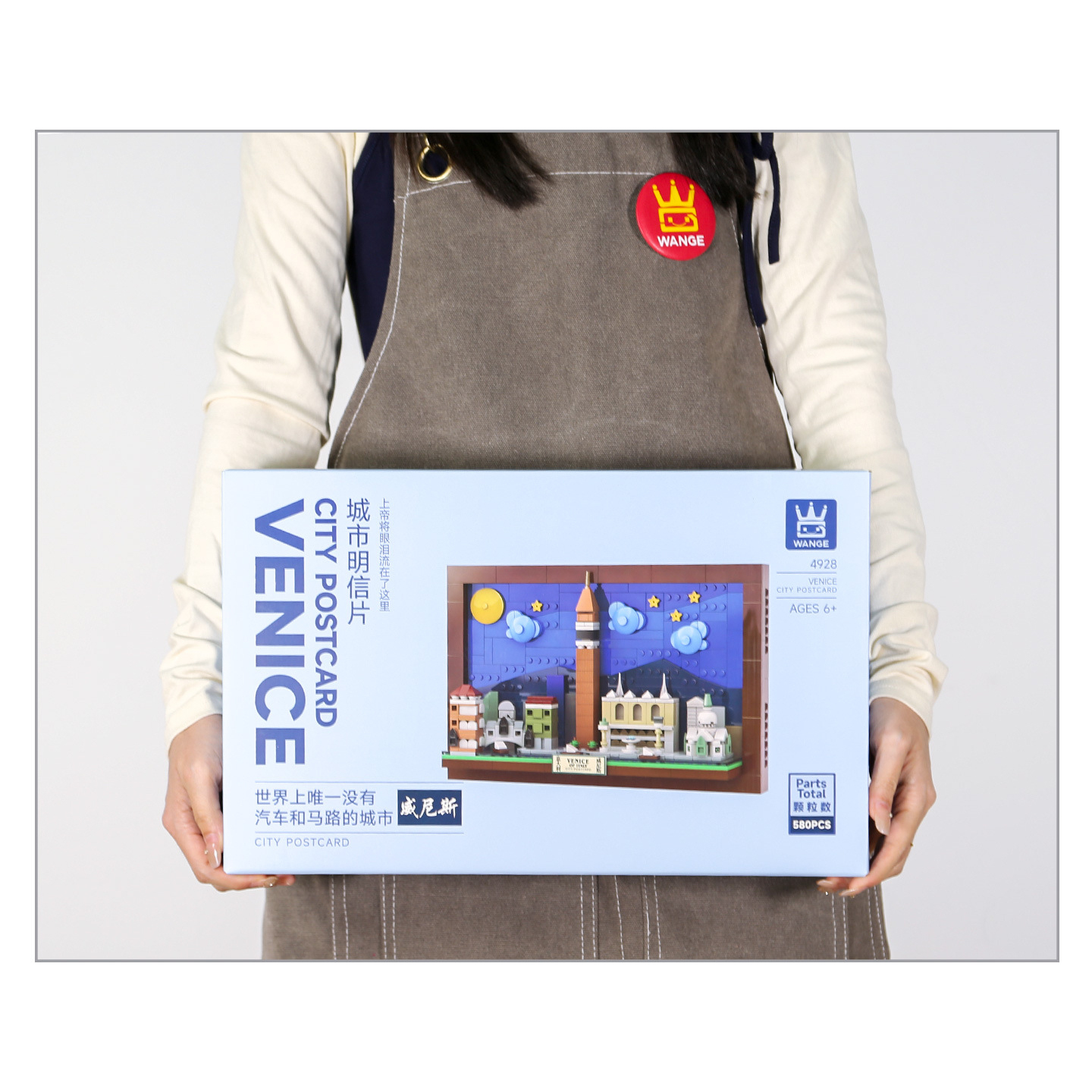 Venice City Postcard building blocks packaging held for scale, showing large format color box with product preview and branding details