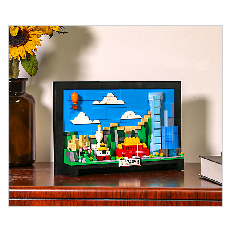 Beijing City Postcard building blocks displayed on a wooden desk, styled as a framed city scene with layered landmarks, adding a decorative touch to a home or workspace