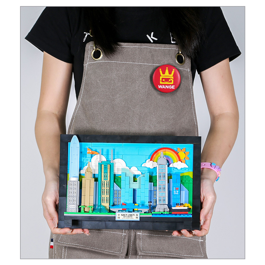 Shenzhen City Postcard building blocks completed model held for scale, featuring colorful skyline, framed structure, and decorative display design