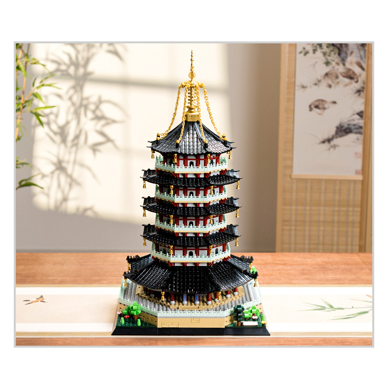 Leifeng Pagoda building blocks model displayed on table, detailed multi-tier architecture with traditional Chinese design and decorative base