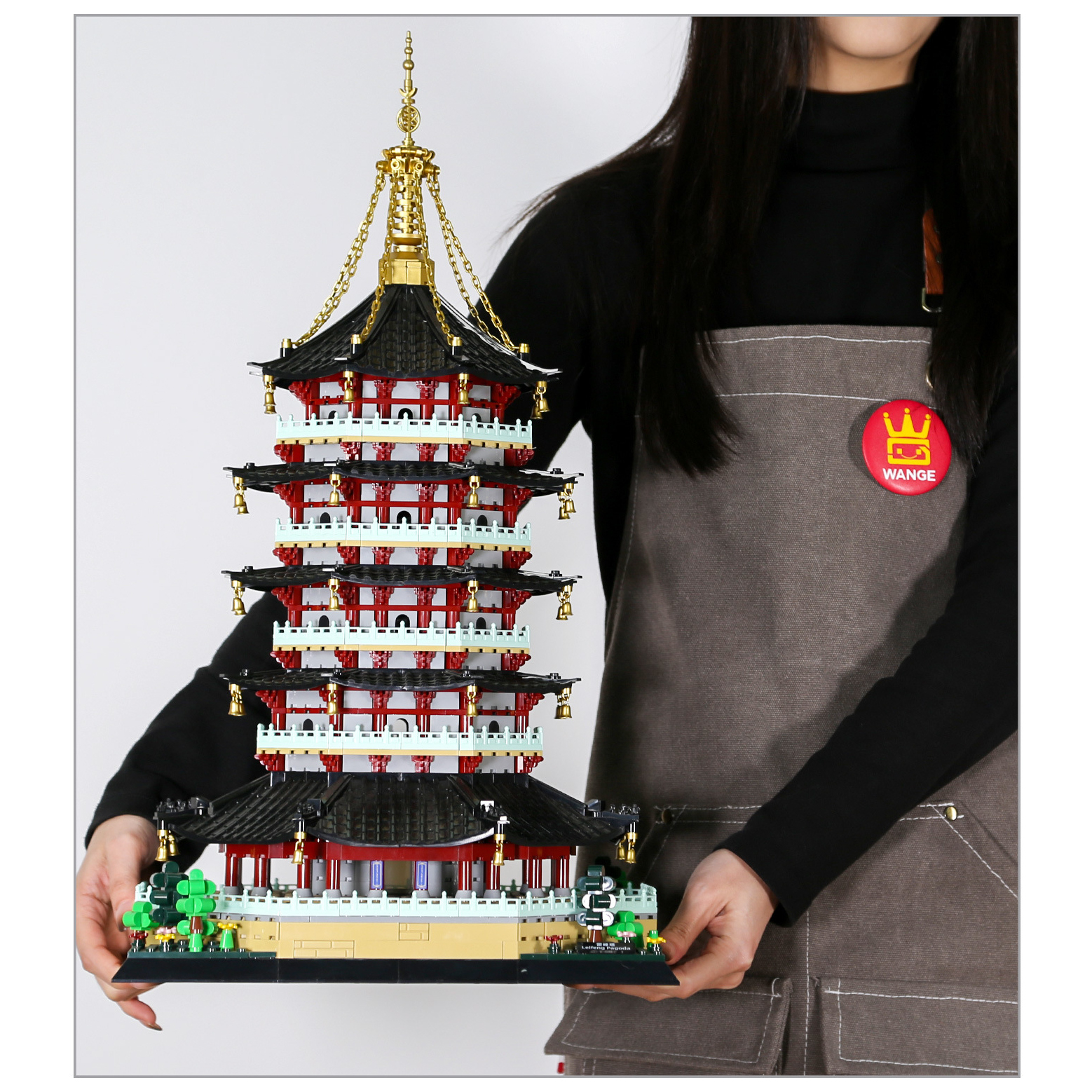 Leifeng Pagoda building blocks model with multi-tiered structure and detailed rooflines, displayed for collection and decoration