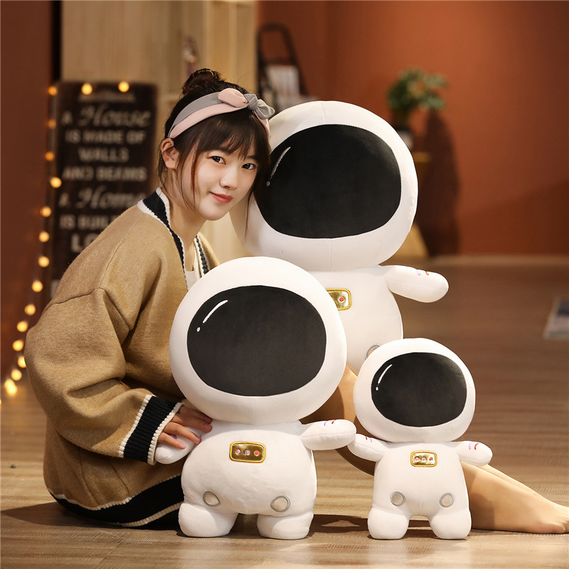 Soft astronaut plush toy in multiple sizes with cozy space-themed design, perfect for hugging, relaxing, and bedroom decor