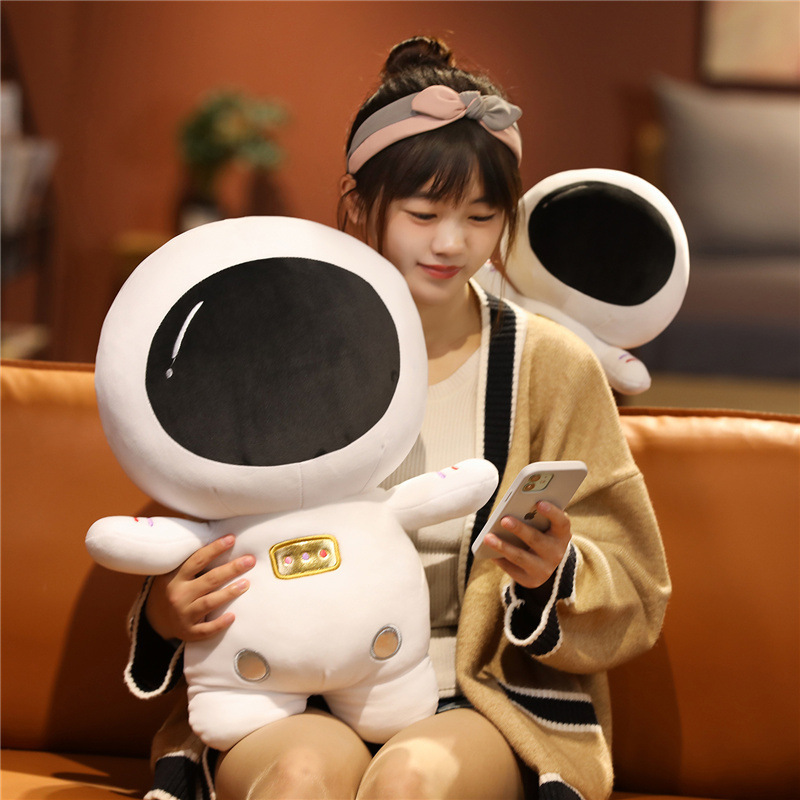 Soft astronaut plush toy with fluffy PP cotton filling, ideal for cuddling, relaxing, and cozy bedroom decoration