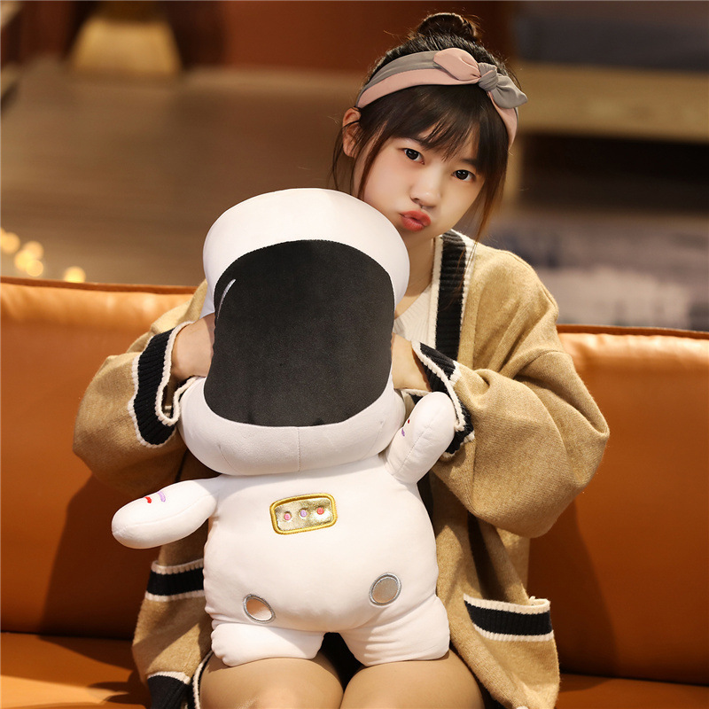 Cute astronaut plush toy with oversized soft helmet design and fluffy PP cotton filling for cuddling and cozy decor