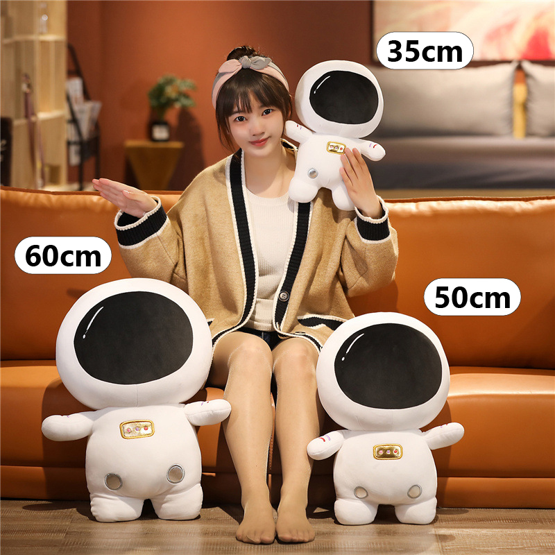Astronaut plush toy size comparison showing 35 cm, 50 cm, and 60 cm soft stuffed doll variations