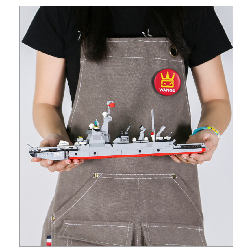 WANGE Type 052D guided missile destroyer building blocks model displayed in hand, highlighting the compact size, ship structure, and detailed naval design