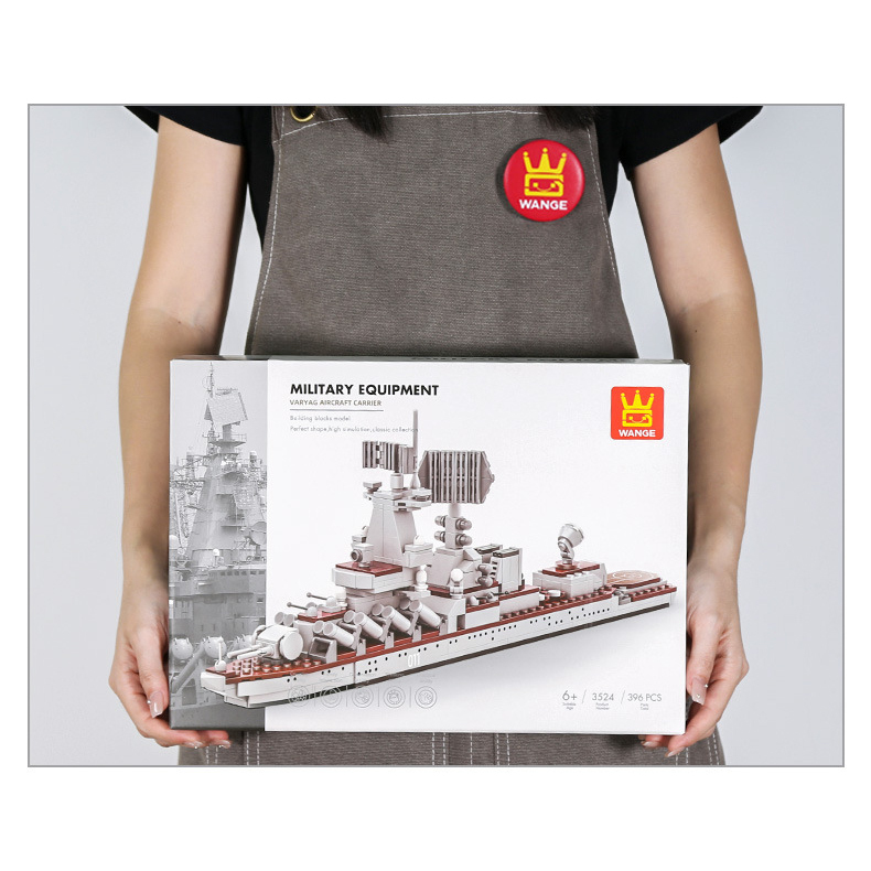 WANGE Varyag Aircraft Carrier building blocks package displayed for size reference, highlighting large-format packaging, military ship artwork, and collectible model presentation