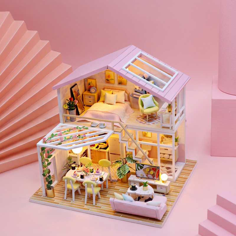 Hongda Sweet Time DIY miniature house featuring soft pink interiors, miniature furniture, warm ambient lighting, and a relaxing modern dollhouse display scene