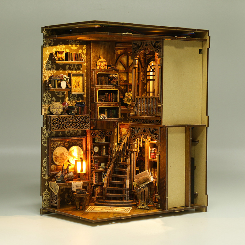 Interior structure view of the vintage library DIY book nook showing layered rooms, staircases, bookshelves, warm LED lighting, and intricate miniature details