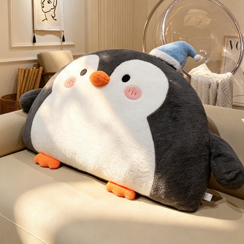 Penguin plush backrest pillow with soft fabric and rounded design placed on a sofa for cozy lounging and decoration
