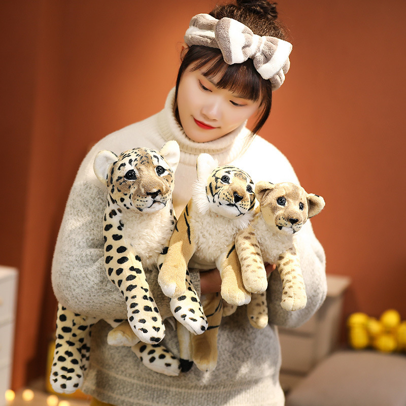 Realistic leopard, tiger, and lion plush toys with detailed wildlife-inspired patterns and soft cuddly textures for collecting, display, and cozy decor